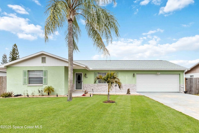 single story home featuring a garage and a front yard