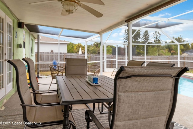 sunroom / solarium with ceiling fan