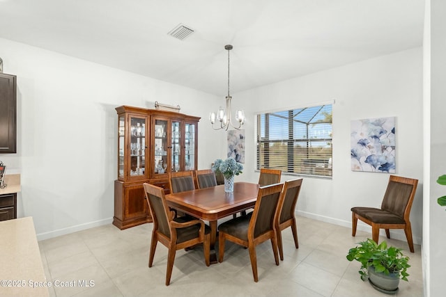 dining room featuring a chandelier