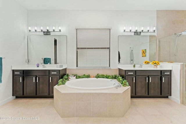 bathroom with vanity, tile patterned flooring, and independent shower and bath