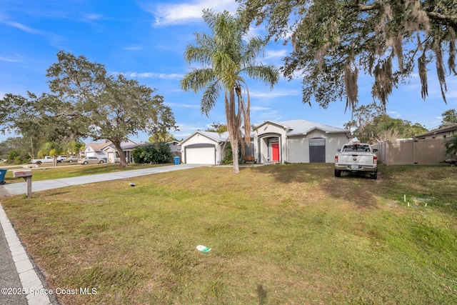 ranch-style home with a front lawn and a garage