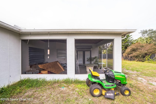 exterior space with a sunroom