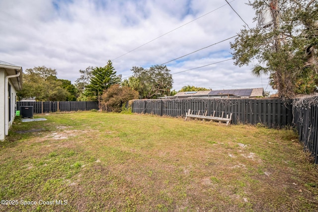 view of yard featuring central AC