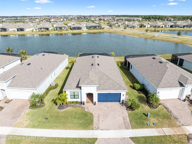 bird's eye view with a water view