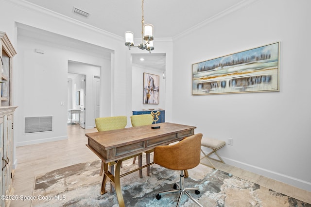 dining room featuring light hardwood / wood-style flooring, crown molding, and a chandelier