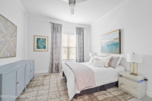 bedroom with ceiling fan and ornamental molding