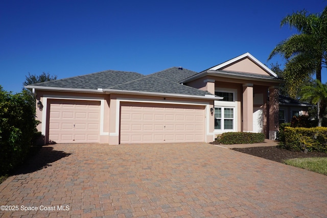 view of front of home featuring a garage