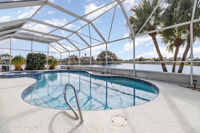 view of swimming pool with a patio area, glass enclosure, a water view, and an in ground hot tub