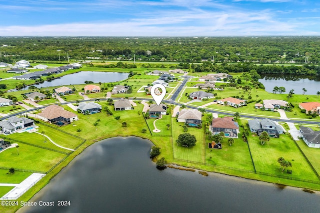 bird's eye view with a water view