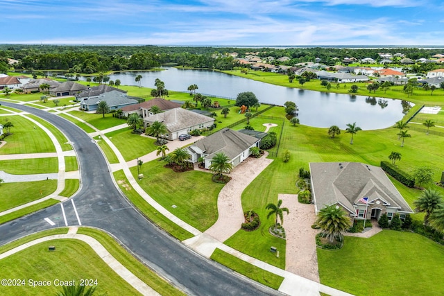 drone / aerial view with a water view