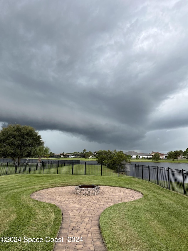 view of yard with a patio area and a fire pit