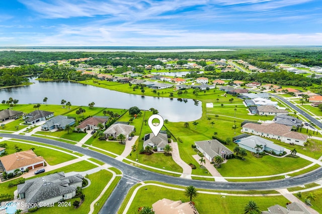 drone / aerial view with a water view