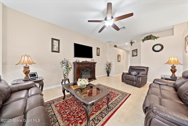 living room with light tile patterned flooring and ceiling fan