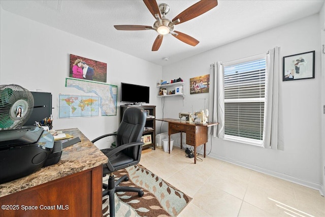 office with light tile patterned floors, a textured ceiling, and ceiling fan