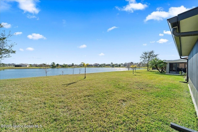 view of yard with a water view