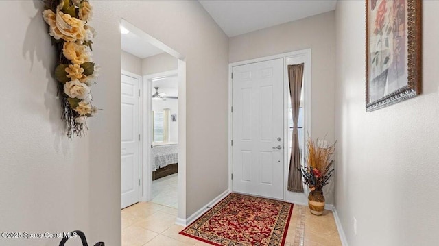 view of tiled foyer entrance