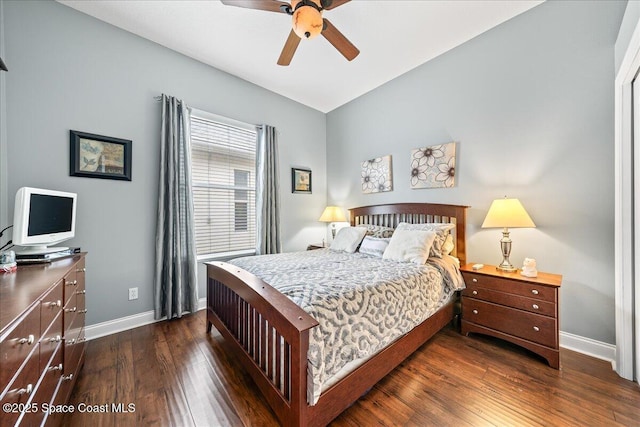 bedroom featuring ceiling fan and dark hardwood / wood-style floors