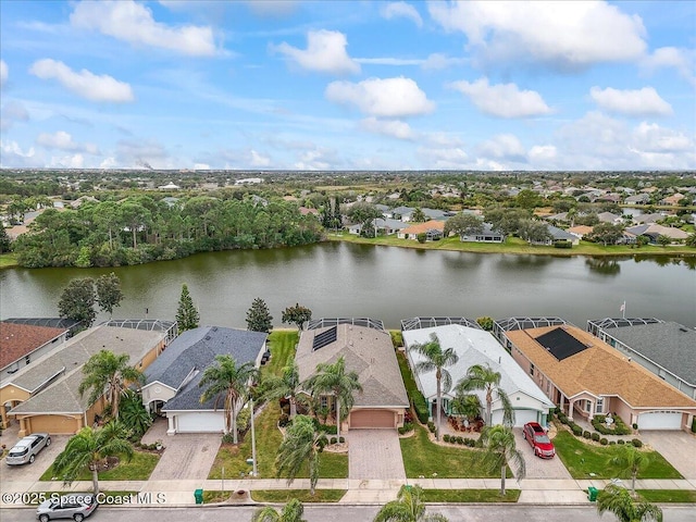 drone / aerial view with a water view