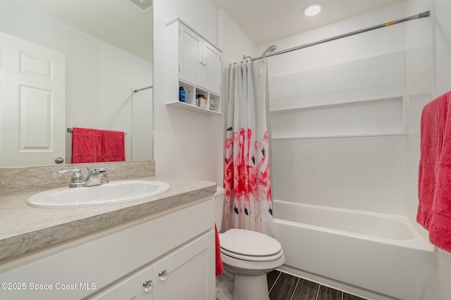 full bathroom featuring toilet, vanity, and shower / bath combo