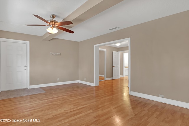 spare room with ceiling fan and light hardwood / wood-style flooring