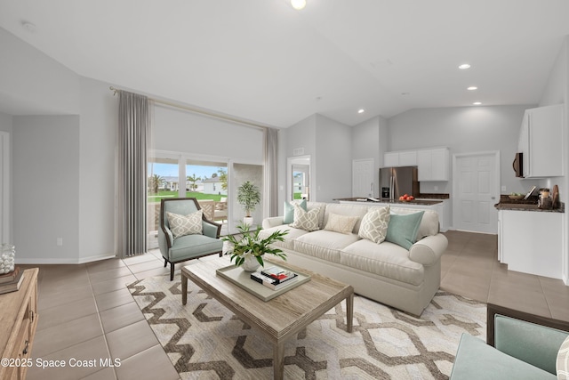 tiled living room with high vaulted ceiling