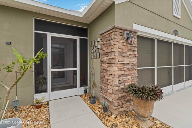 entrance to property featuring a garage