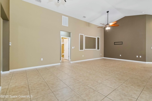 unfurnished room featuring ceiling fan, light tile patterned floors, and high vaulted ceiling