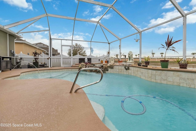 view of pool featuring a lanai and a patio