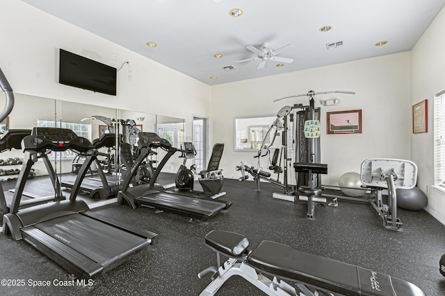 workout area with ceiling fan