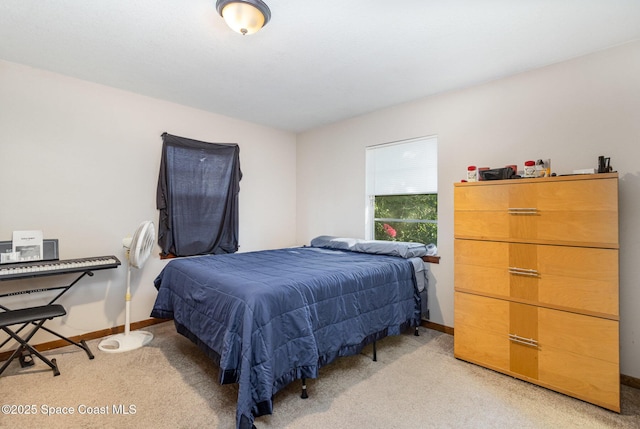 bedroom with light carpet