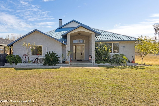 view of front facade featuring a front yard