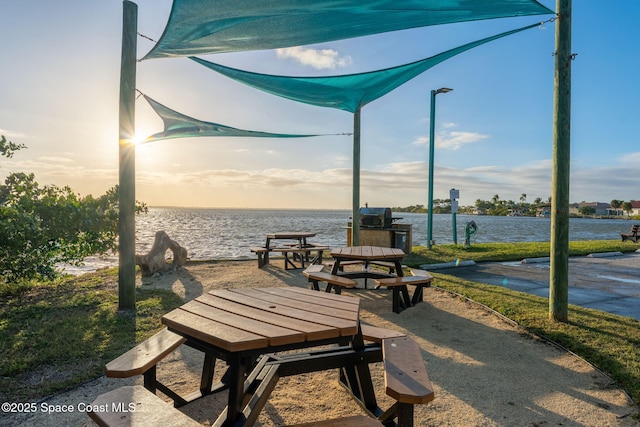 view of home's community with a water view