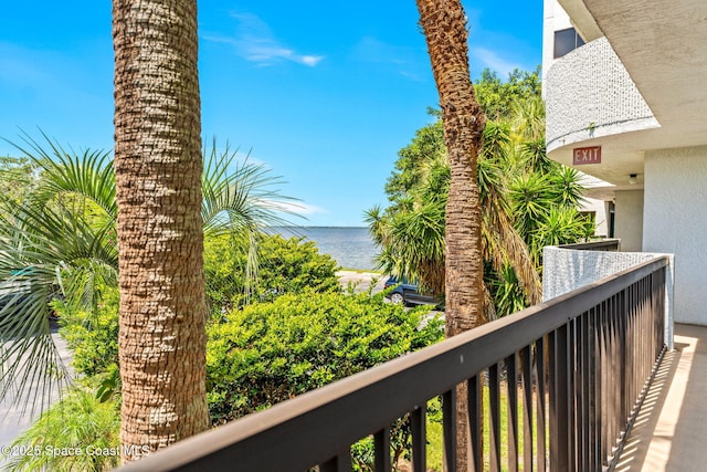 balcony featuring a water view