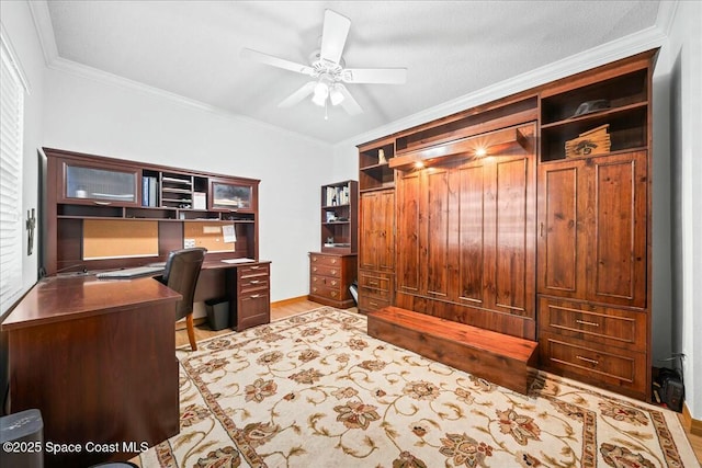 office space with ceiling fan, crown molding, and a healthy amount of sunlight