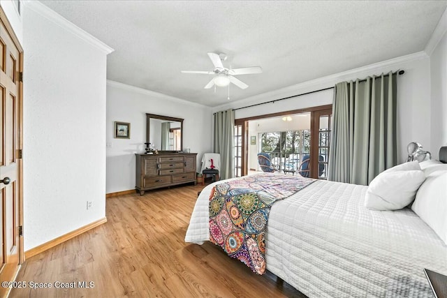 bedroom with ceiling fan, ornamental molding, light hardwood / wood-style floors, and access to outside