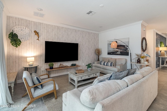 tiled living room featuring ornamental molding and wooden walls