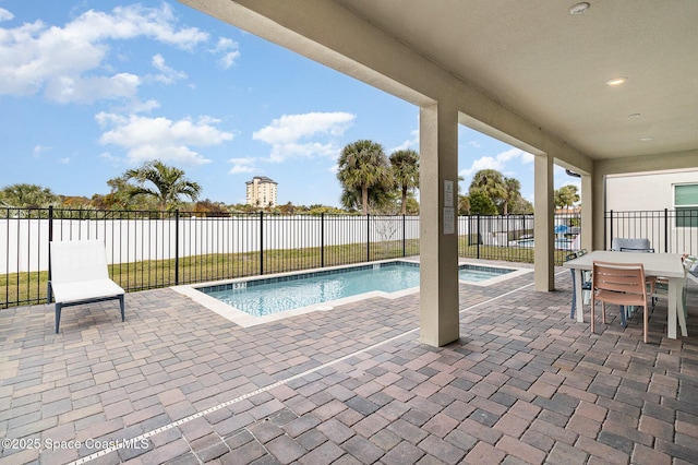 view of pool featuring a patio