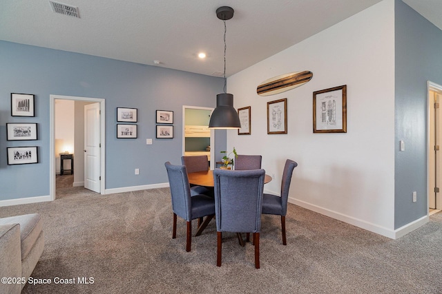 view of carpeted dining room