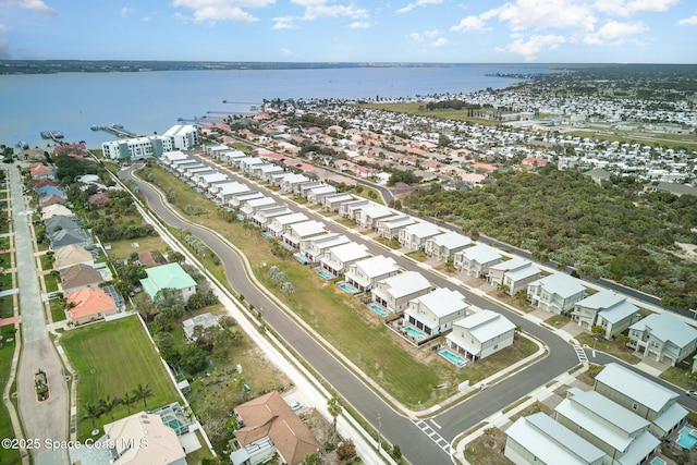 drone / aerial view with a water view