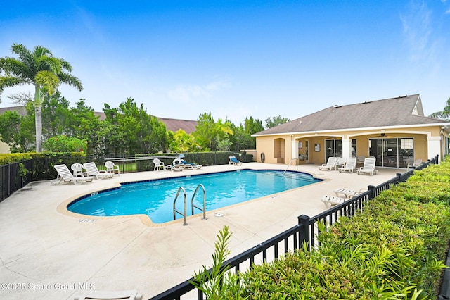 view of pool with a patio area