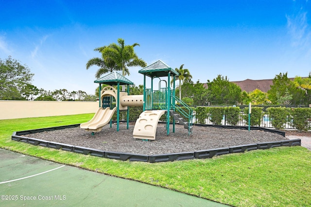 view of play area featuring a lawn