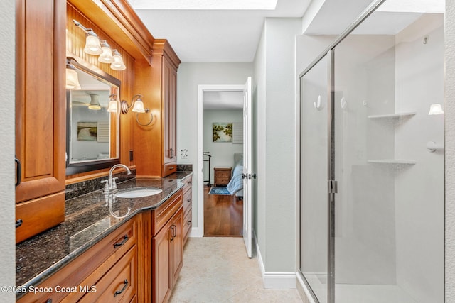 bathroom featuring vanity and walk in shower