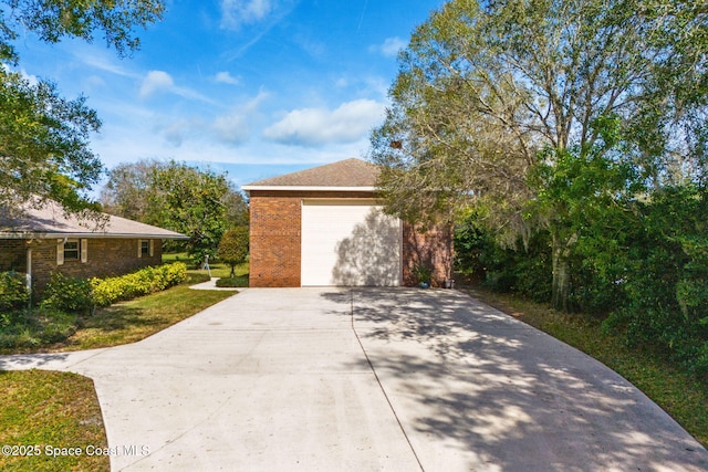 view of property exterior featuring a garage