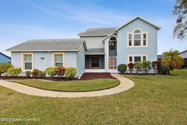 view of front property featuring a front lawn