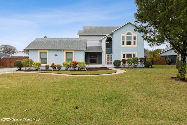 front facade featuring a front lawn