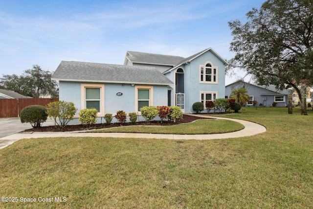 view of property featuring a front yard