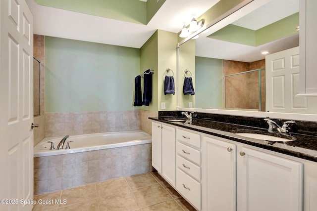 bathroom with vanity, tile patterned floors, and separate shower and tub