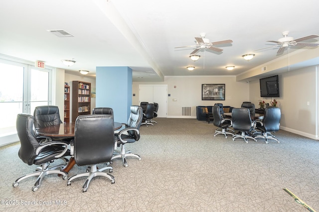 office featuring crown molding, ceiling fan, and light carpet