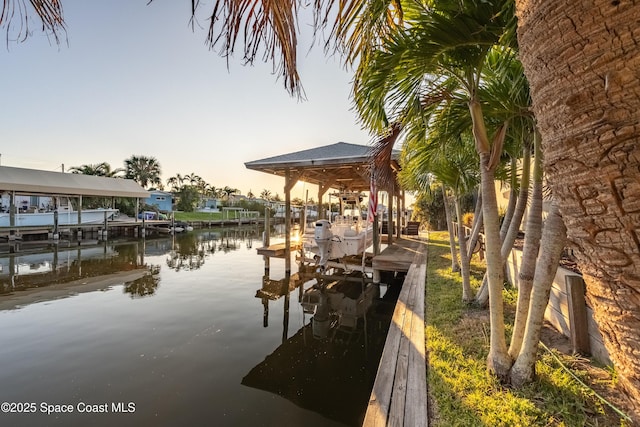 view of dock with a water view