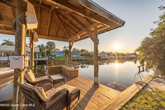 dock area featuring a water view